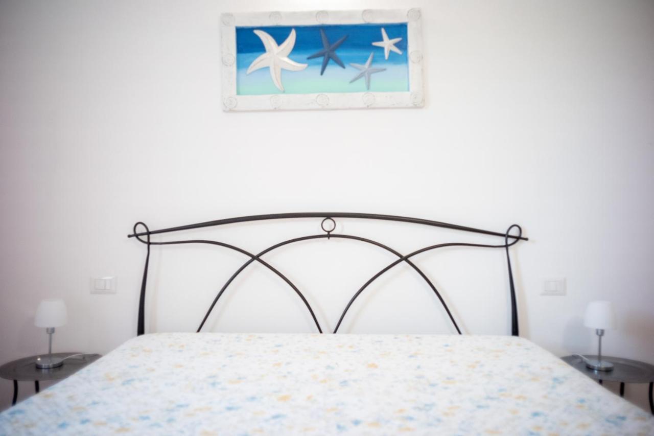 Dimora Mare Apartment ซาน เตโอโดโร ภายนอก รูปภาพ